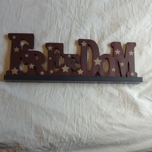 Freestanding freedom sign, wood.